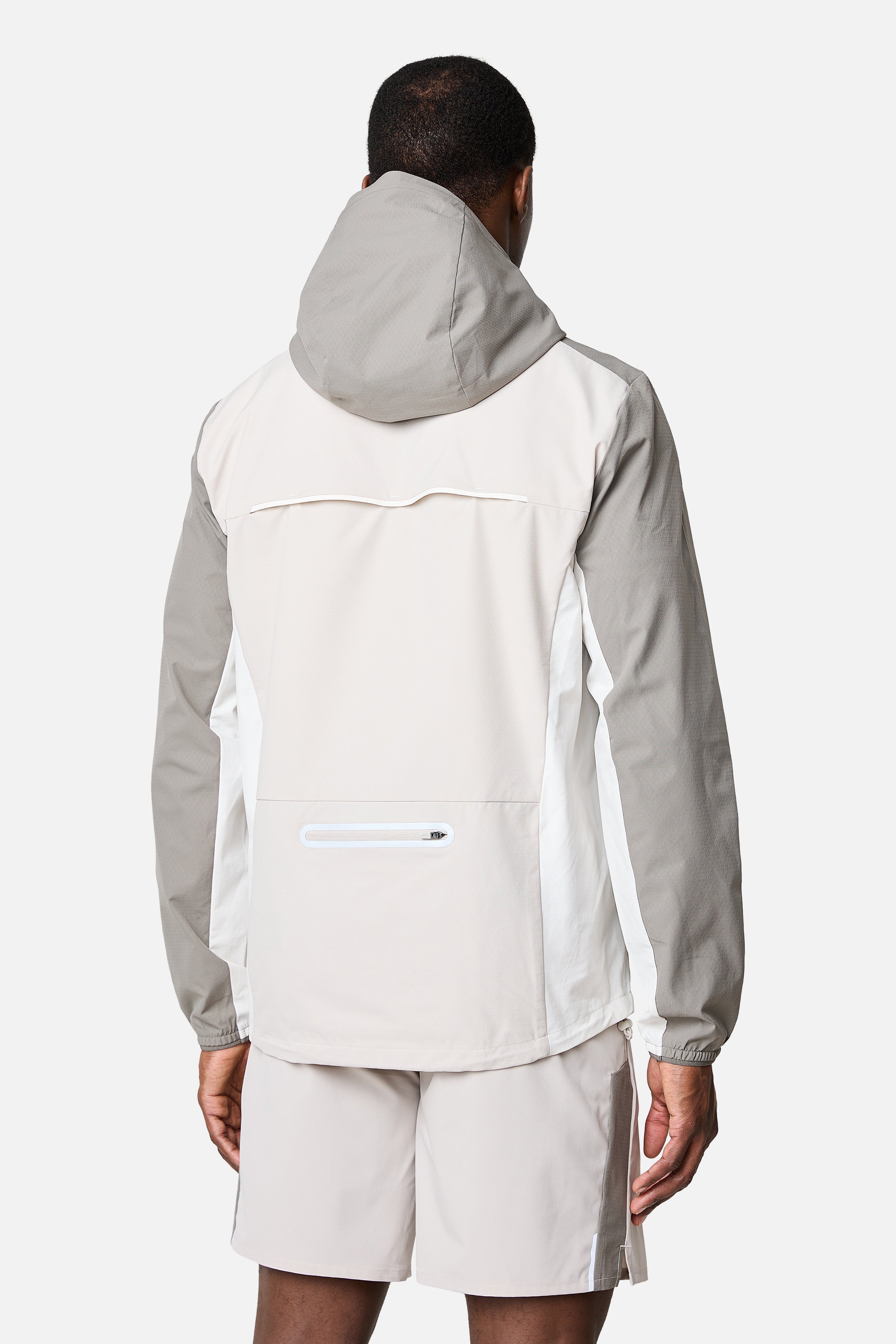 SS26 Triathlon-Windbreaker – Kieselstein/Mokka/Mattweiß